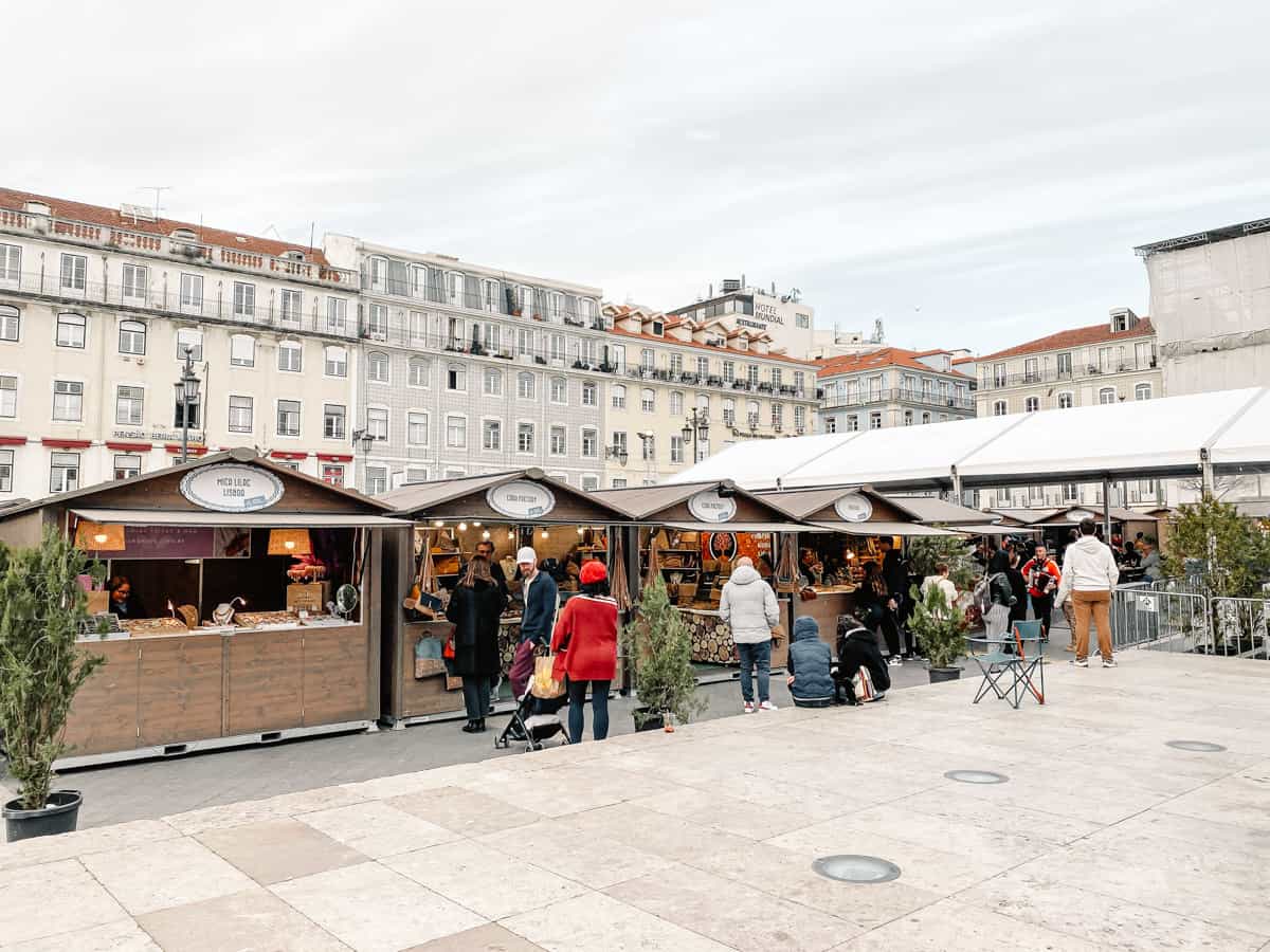 Produce stalls at an outdoor market in Portugal