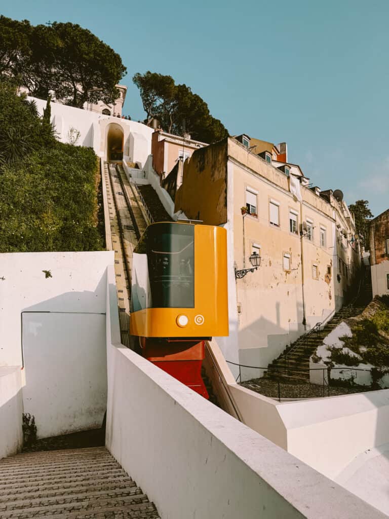 Graça Funicular is bright yellow and travels up and down a steep ridge in Lisbon city centre.