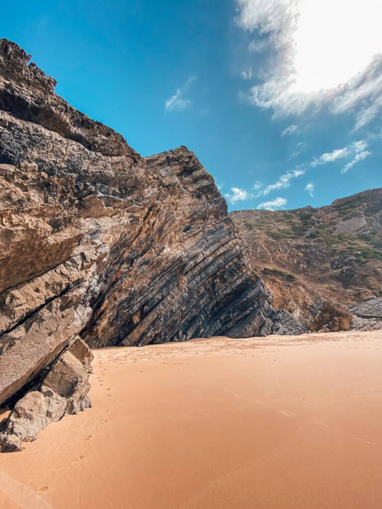 Sintra beach Praia da Adraga with stunning rock formations